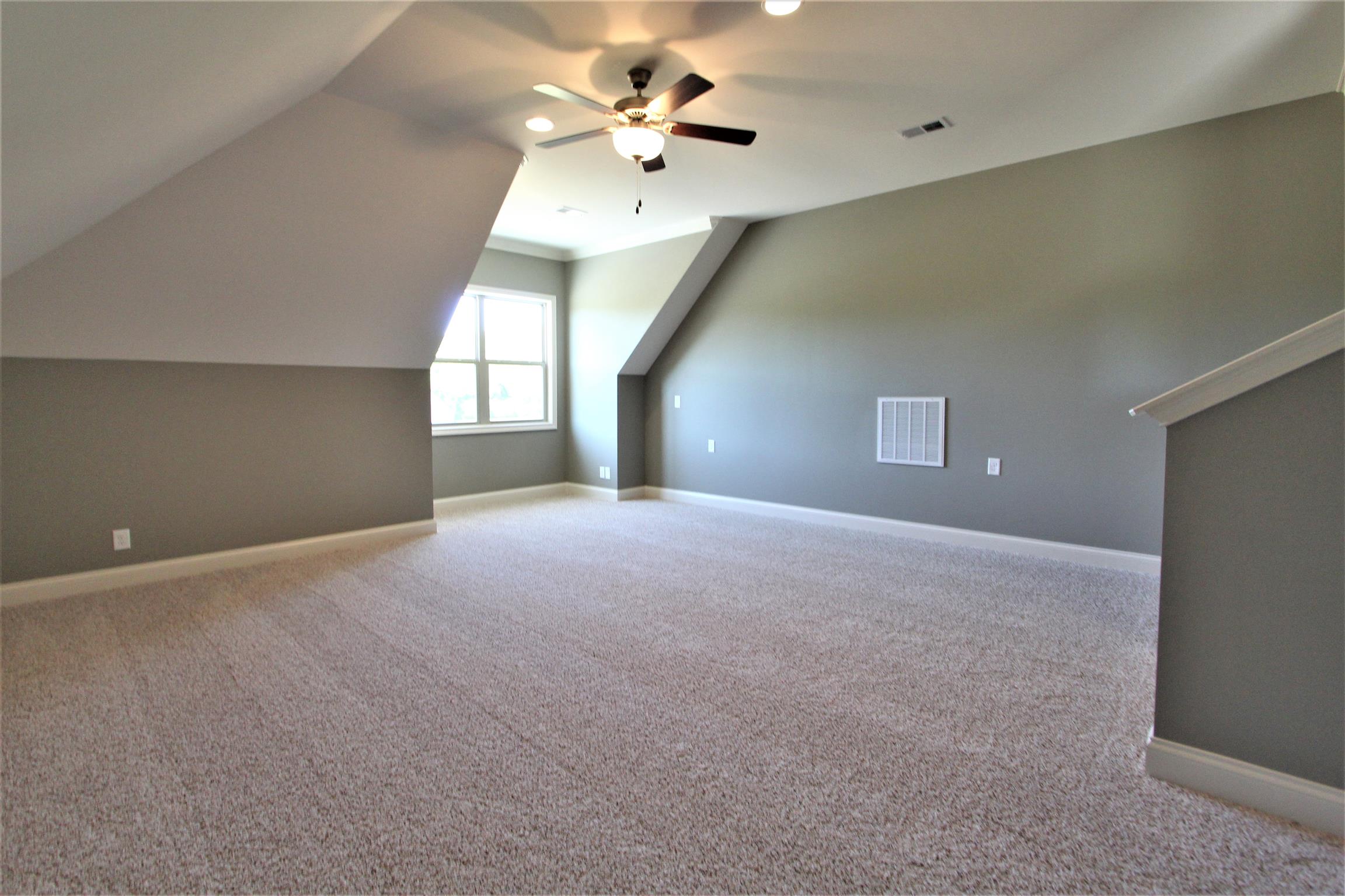 3818 Old Murfreesboro Road West, Unit 5 Lebanon, TN 37090 - Photo 25 of 27 a view of a room with windows and ceiling fan