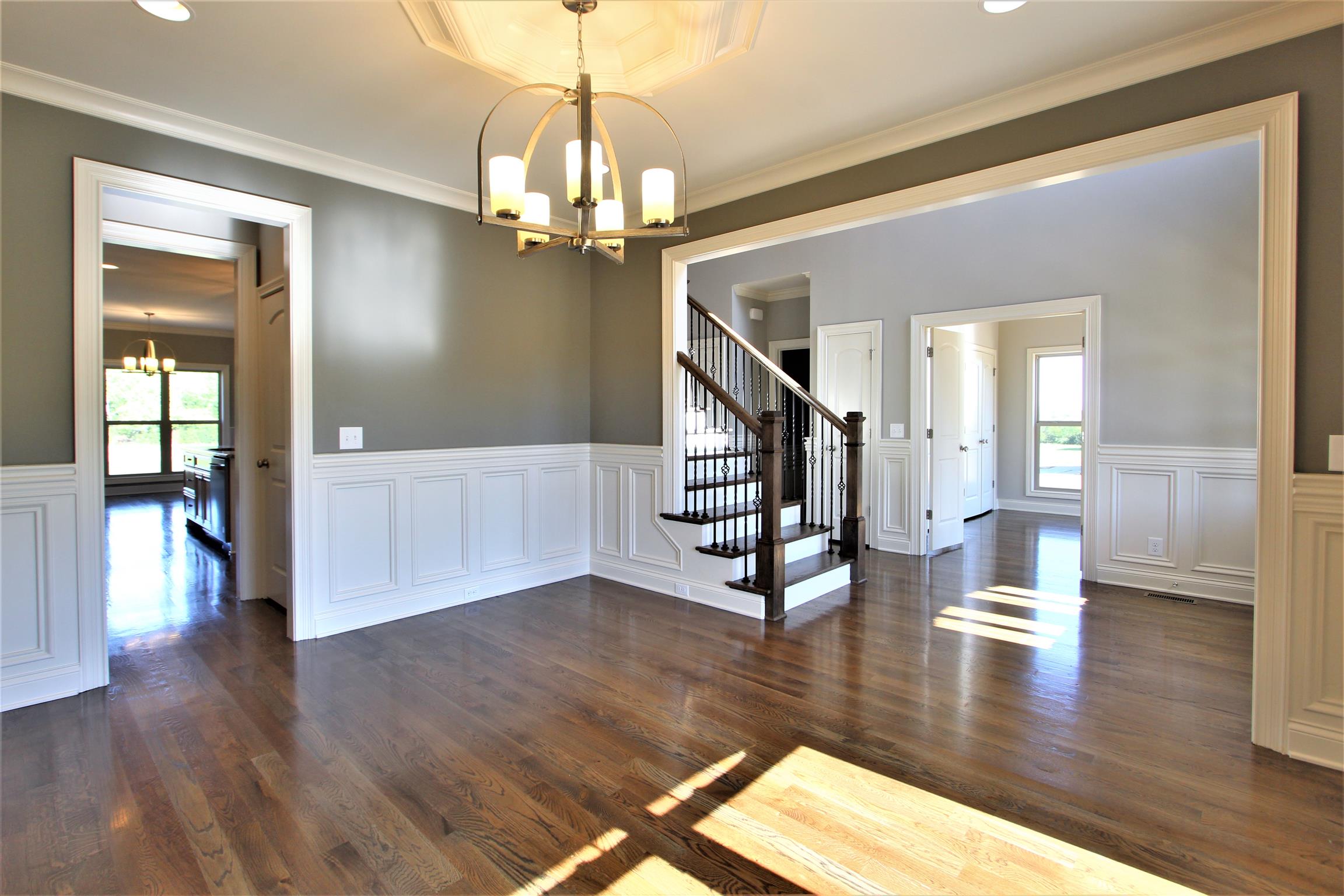 3818 Old Murfreesboro Road West, Unit 5 Lebanon, TN 37090 - Photo 4 of 27 a view of a livingroom with wooden floor and staircase