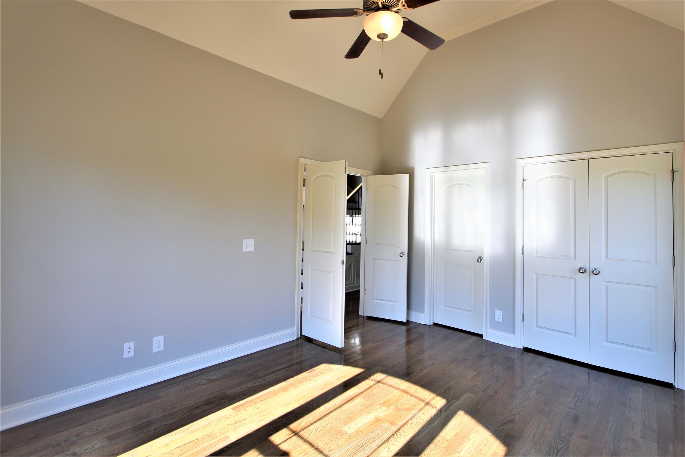 3818 Old Murfreesboro Road West, Unit 5 Lebanon, TN 37090 - Photo 6 of 27 a view of empty room with wooden floor