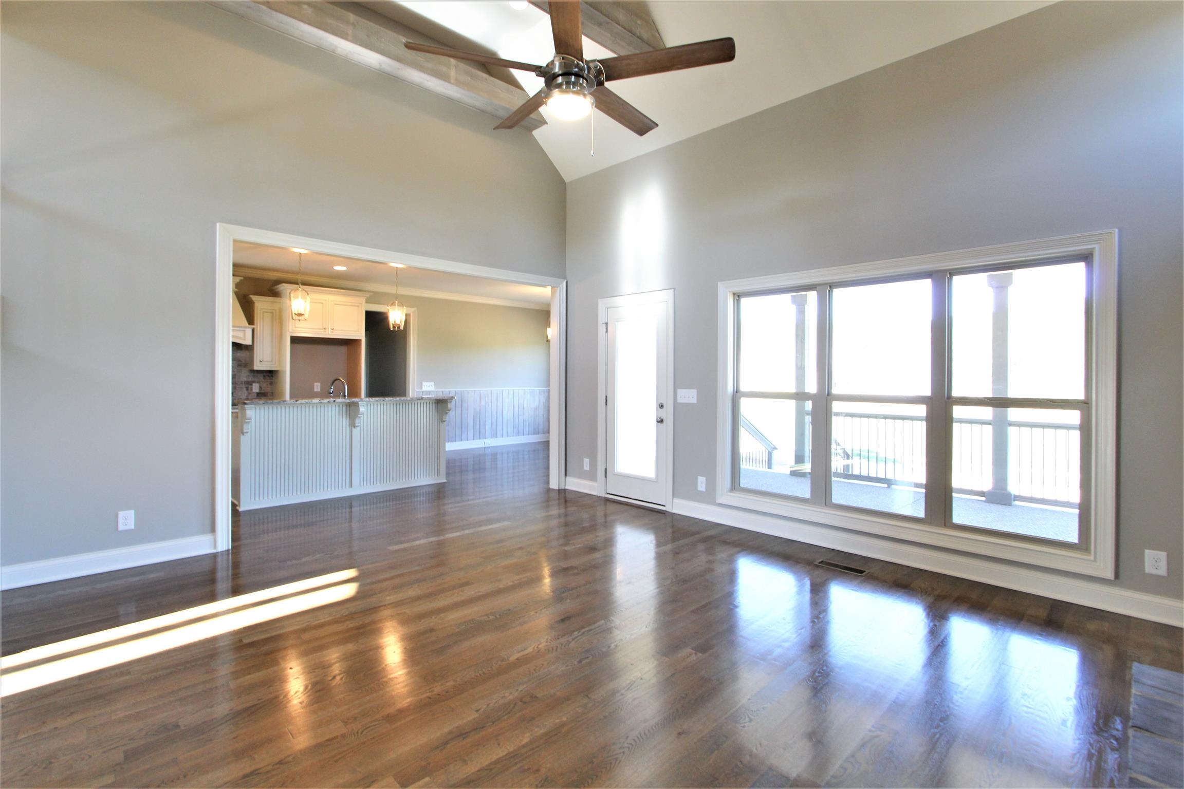 3818 Old Murfreesboro Road West, Unit 5 Lebanon, TN 37090 - Photo 10 of 27 wooden floor in an empty room with a window