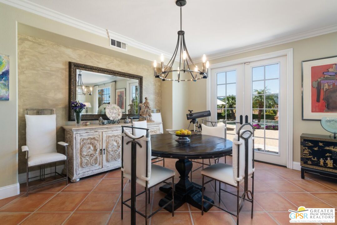 45211 Willowick Street Temecula, CA 92592 - Photo 11 of 69 a view of a dining room with furniture and chandelier