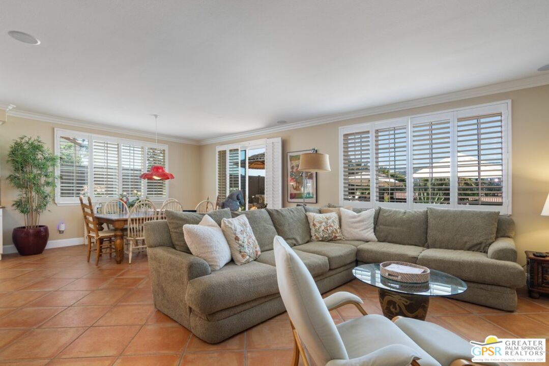 45211 Willowick Street Temecula, CA 92592 - Photo 15 of 69 a living room with furniture and a large window