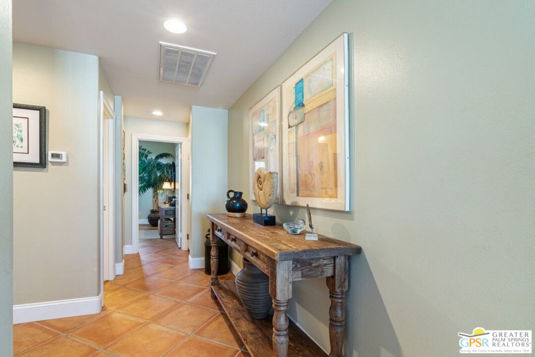 45211 Willowick Street Temecula, CA 92592 - Photo 16 of 69 a bathroom with sink a mirror and a shower
