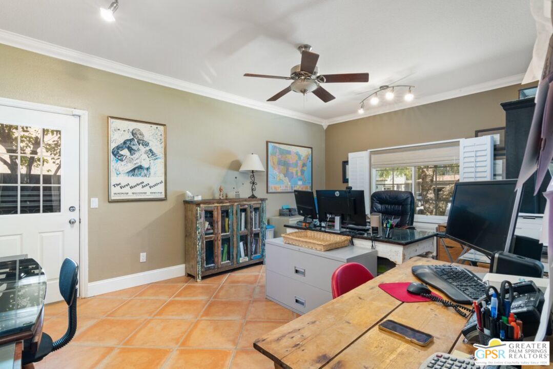 45211 Willowick Street Temecula, CA 92592 - Photo 21 of 69 a living room with furniture and a flat screen tv