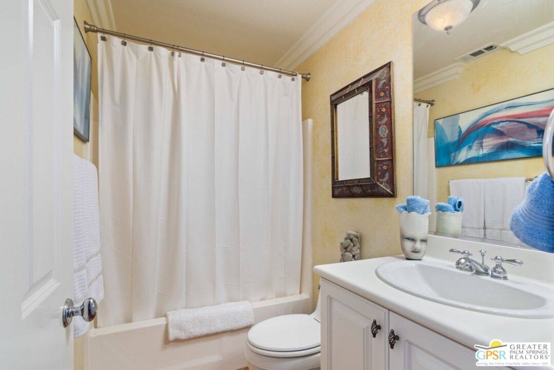 45211 Willowick Street Temecula, CA 92592 - Photo 33 of 69 a bathroom with a sink toilet and shower