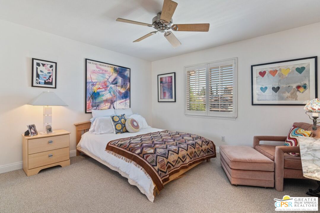 45211 Willowick Street Temecula, CA 92592 - Photo 36 of 69 a bedroom with a bed and a couch