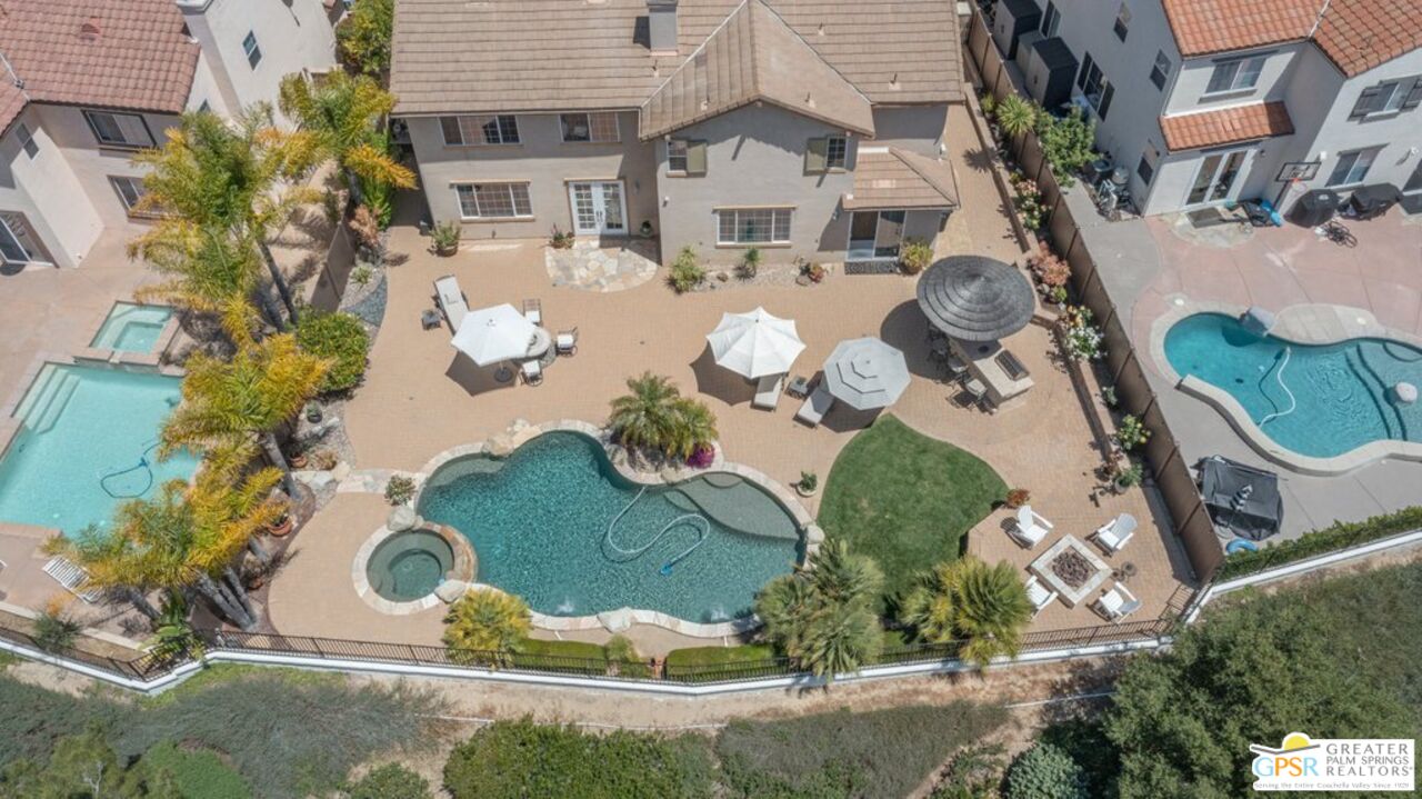 45211 Willowick Street Temecula, CA 92592 - Photo 46 of 69 an aerial view of a house with a swimming pool