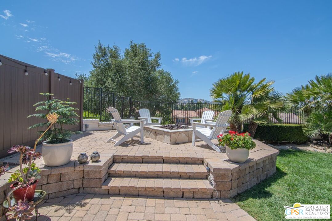45211 Willowick Street Temecula, CA 92592 - Photo 47 of 69 a view of a patio with couches and potted plants