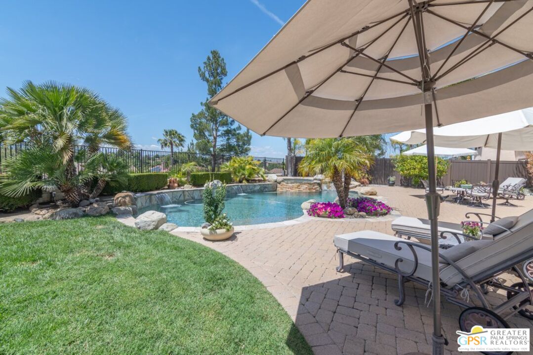 45211 Willowick Street Temecula, CA 92592 - Photo 50 of 69 a view of a backyard with sitting area