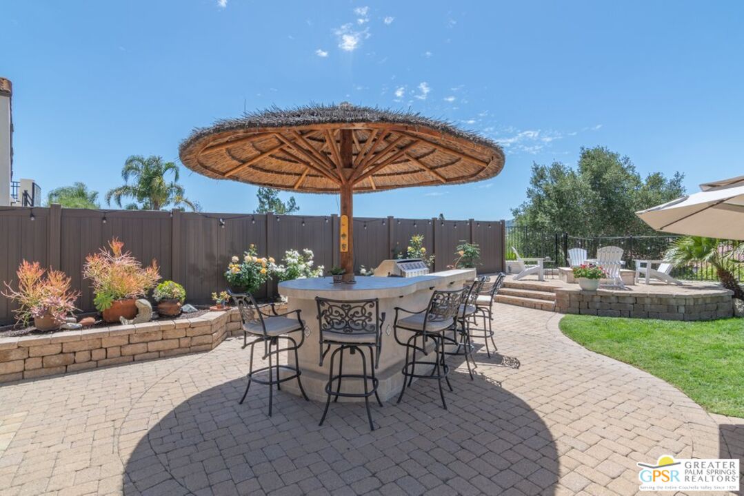 45211 Willowick Street Temecula, CA 92592 - Photo 51 of 69 a view of a table and chairs in patio