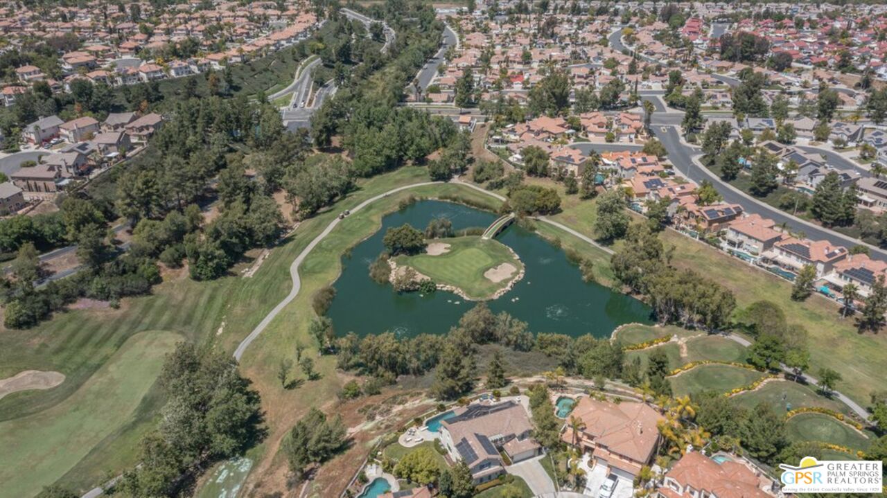 45211 Willowick Street Temecula, CA 92592 - Photo 65 of 69 an aerial view of a house with a yard