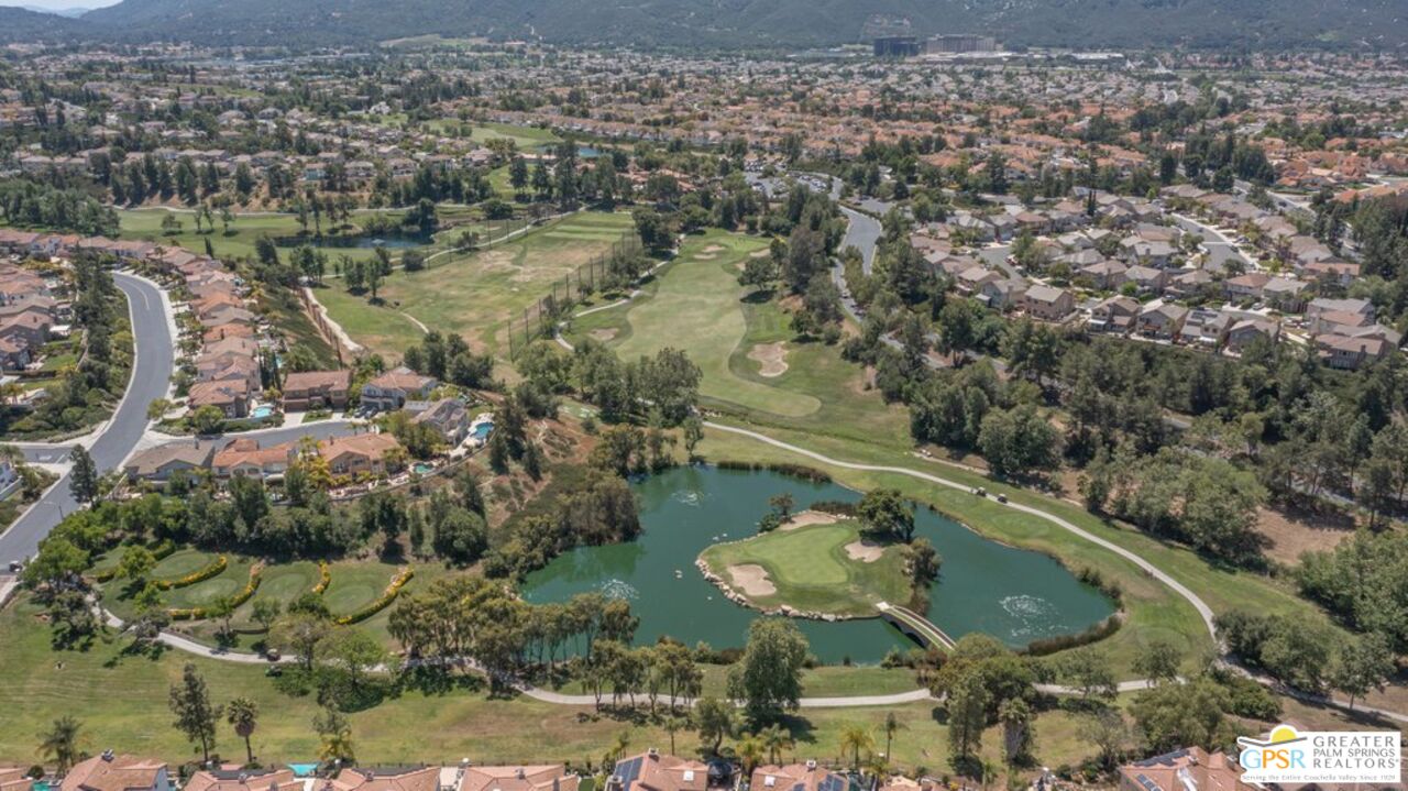 45211 Willowick Street Temecula, CA 92592 - Photo 66 of 69 an aerial view of residential houses with outdoor space and trees