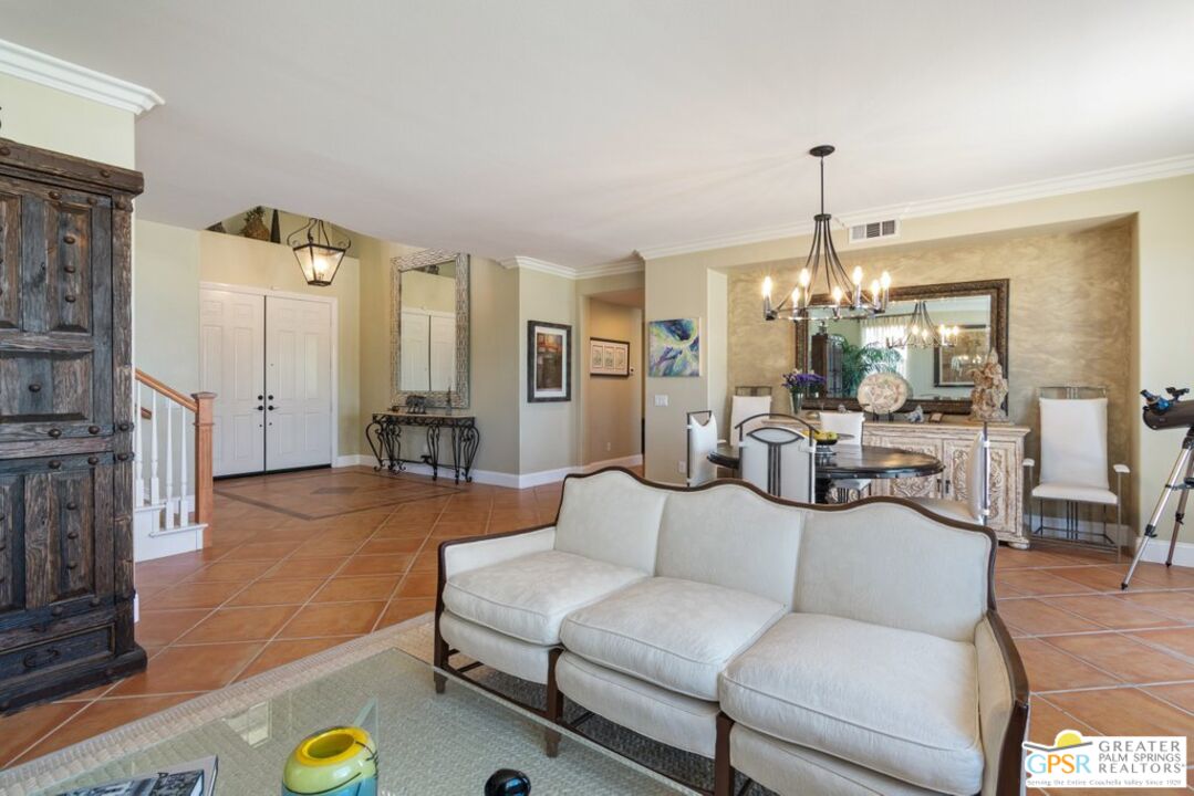 45211 Willowick Street Temecula, CA 92592 - Photo 10 of 69 a living room with furniture and a chandelier