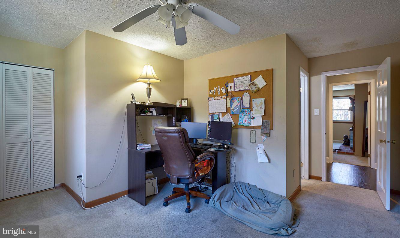 443 Pricketts Mill Road Tabernacle, NJ 08088 - Photo 19 of 37 a view of a workspace with furniture and a livingroom