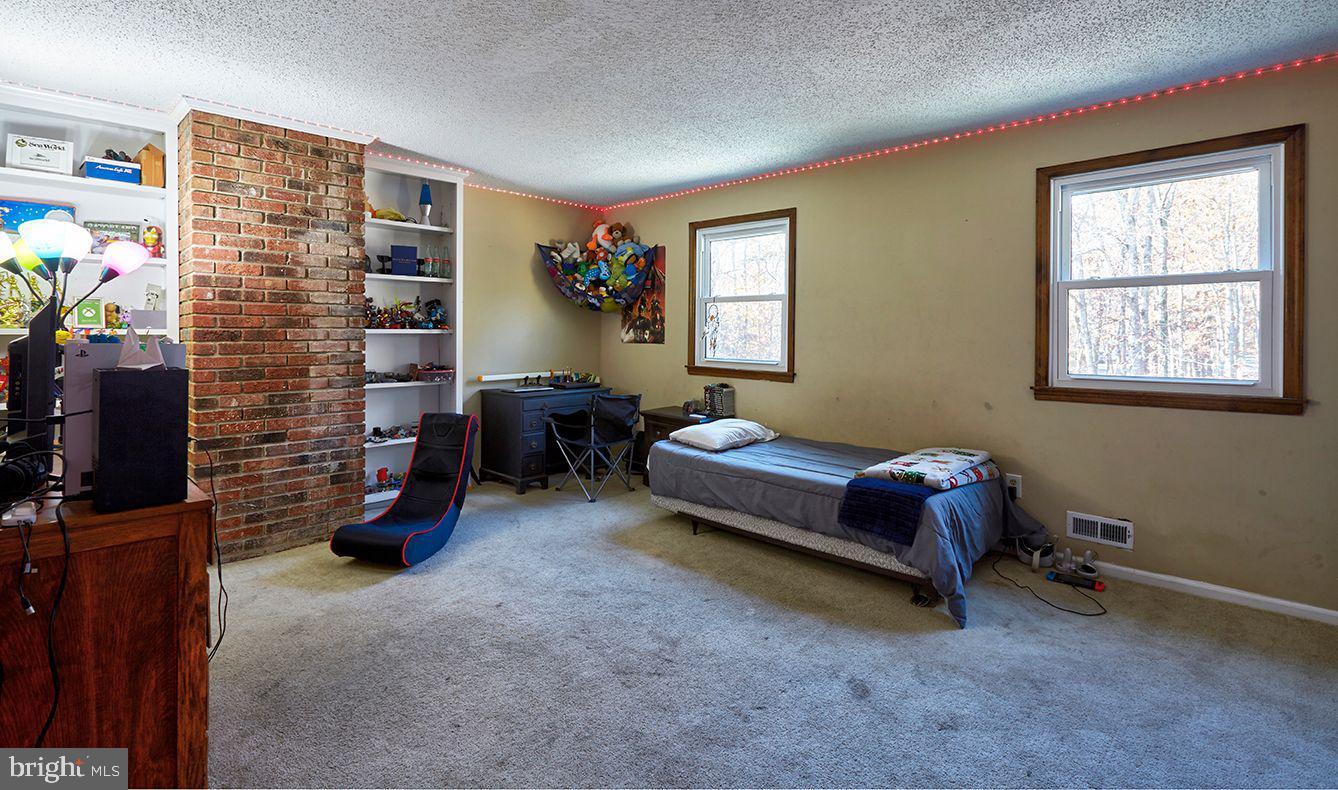 443 Pricketts Mill Road Tabernacle, NJ 08088 - Photo 24 of 37 a bedroom with a bed and a window