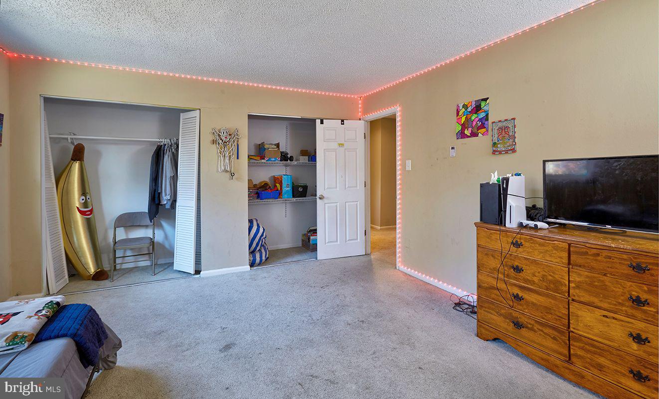 443 Pricketts Mill Road Tabernacle, NJ 08088 - Photo 25 of 37 a living room with furniture and a flat screen tv