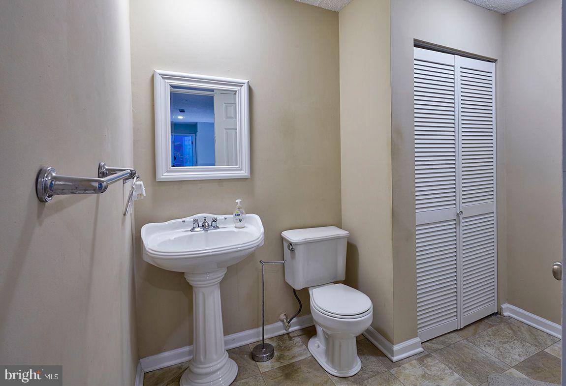 443 Pricketts Mill Road Tabernacle, NJ 08088 - Photo 26 of 37 a bathroom with a toilet sink and mirror