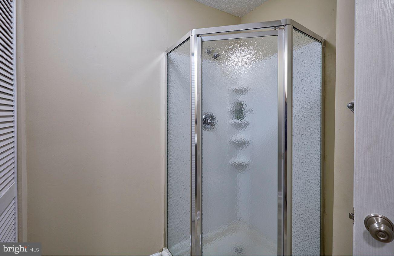 443 Pricketts Mill Road Tabernacle, NJ 08088 - Photo 27 of 37 a bathroom with a glass shower door