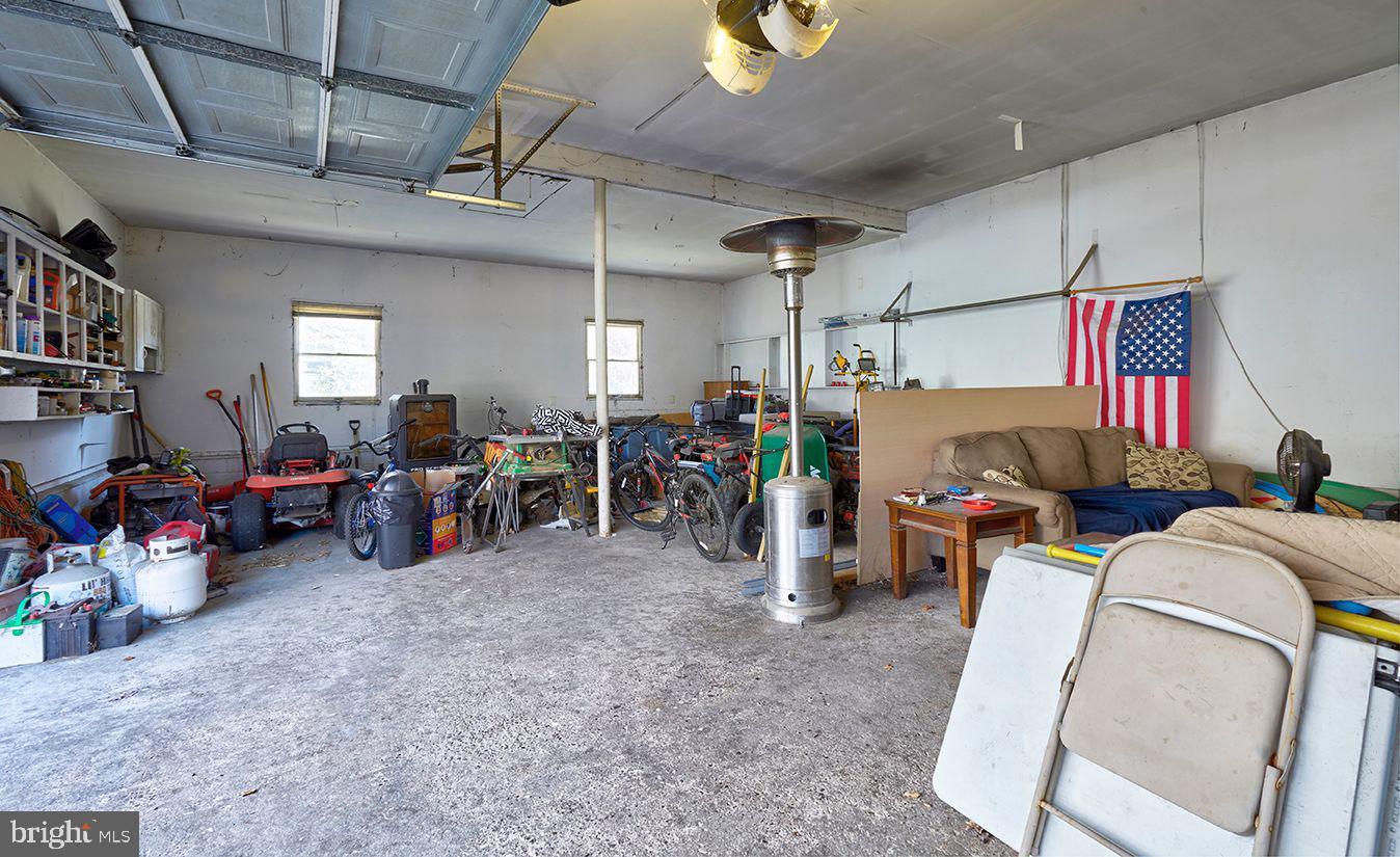 443 Pricketts Mill Road Tabernacle, NJ 08088 - Photo 35 of 37 a living room with lots of furniture and a refrigerator