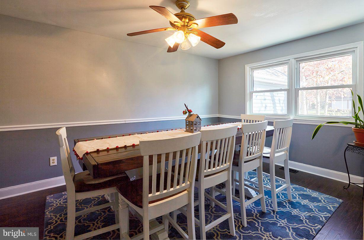 443 Pricketts Mill Road Tabernacle, NJ 08088 - Photo 10 of 37 a view of a dining room with furniture and a chandelier