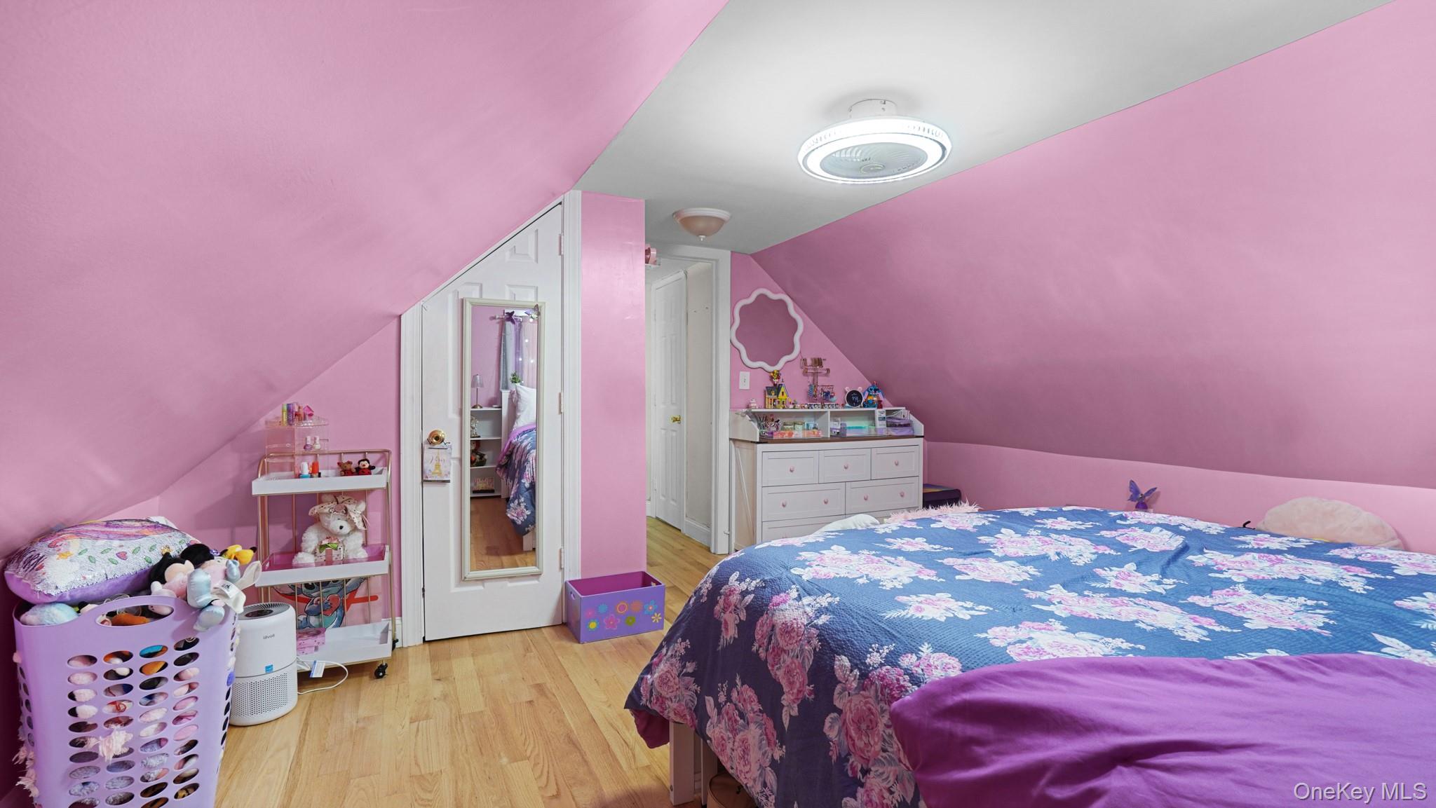 172-17 Amelia Road Queens, NY 11434 - Photo 14 of 18 a bedroom with a bed and a dresser
