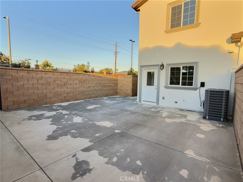 15909 Merrill Avenue, Unit 1 Fontana, CA 92335 - Photo 7 of 7 a view of a house with backyard