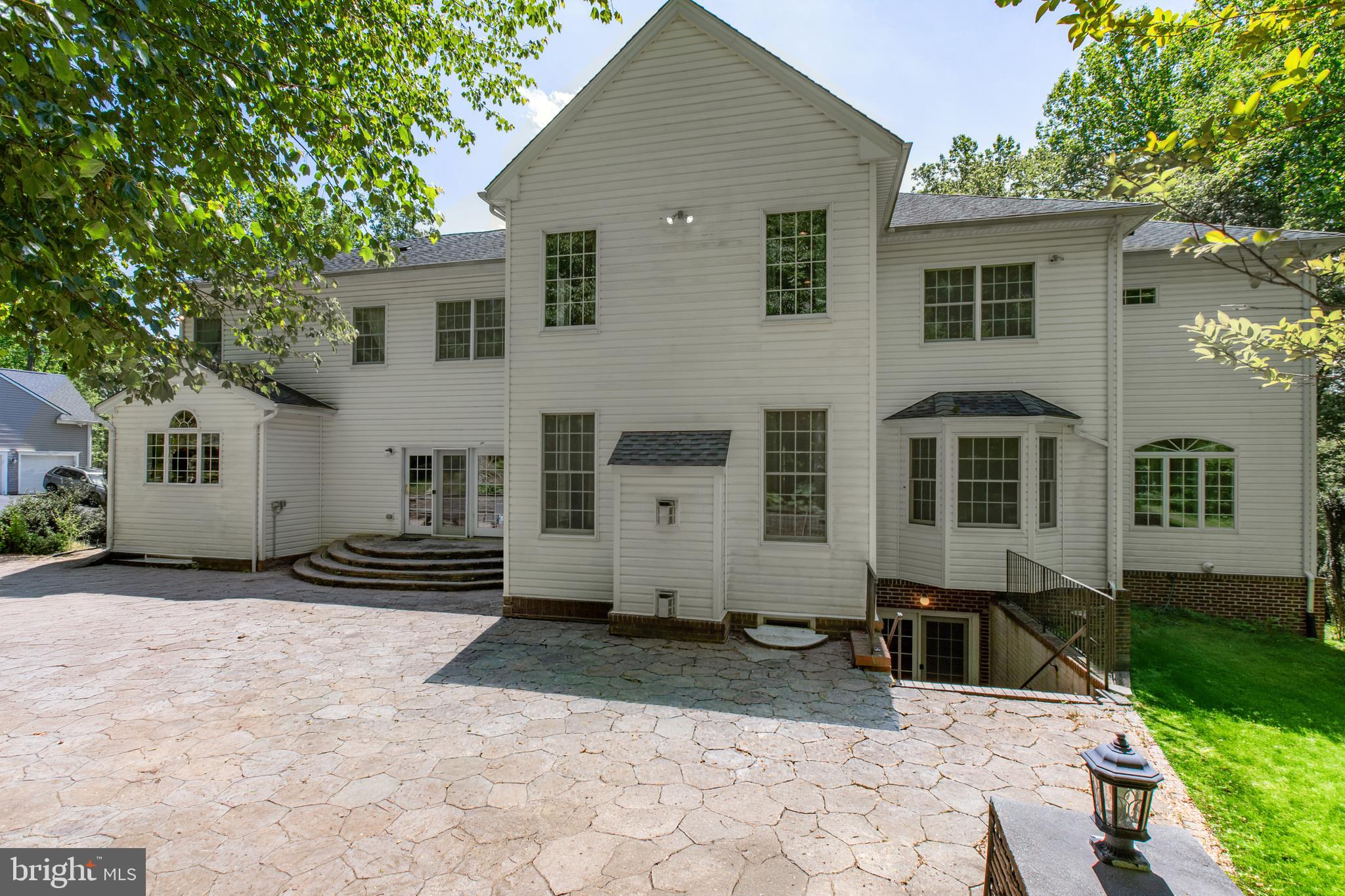 1601 Rushing Stream Court Forest Hill, MD 21050 - Photo 4 of 72 Rear paver patio with basement walkup