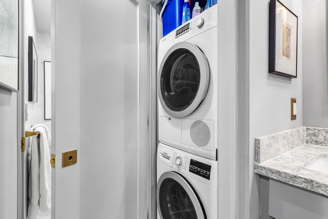a utility room with dryer and washer