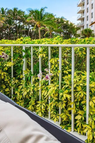 view of a swimming pool from a balcony