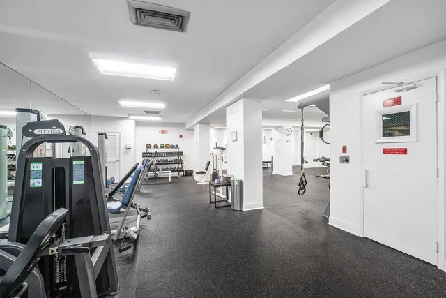 a view of a swimming pool and an outdoor space