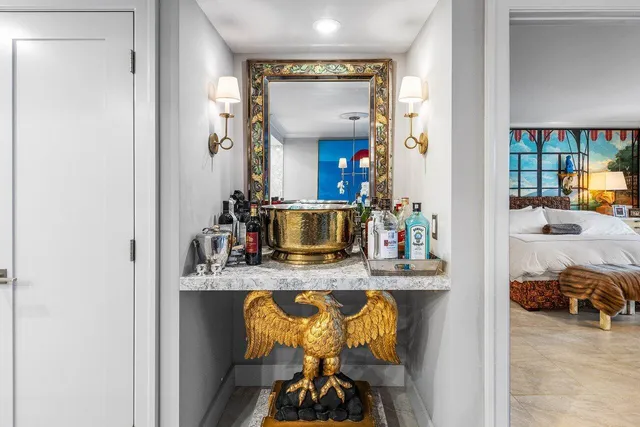 a view of living room with furniture and a fireplace