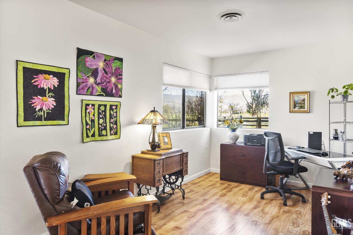 Undisclosed Address Tehachapi, CA 93561 - Photo 22 of 48 a view of a workspace with furniture and a window