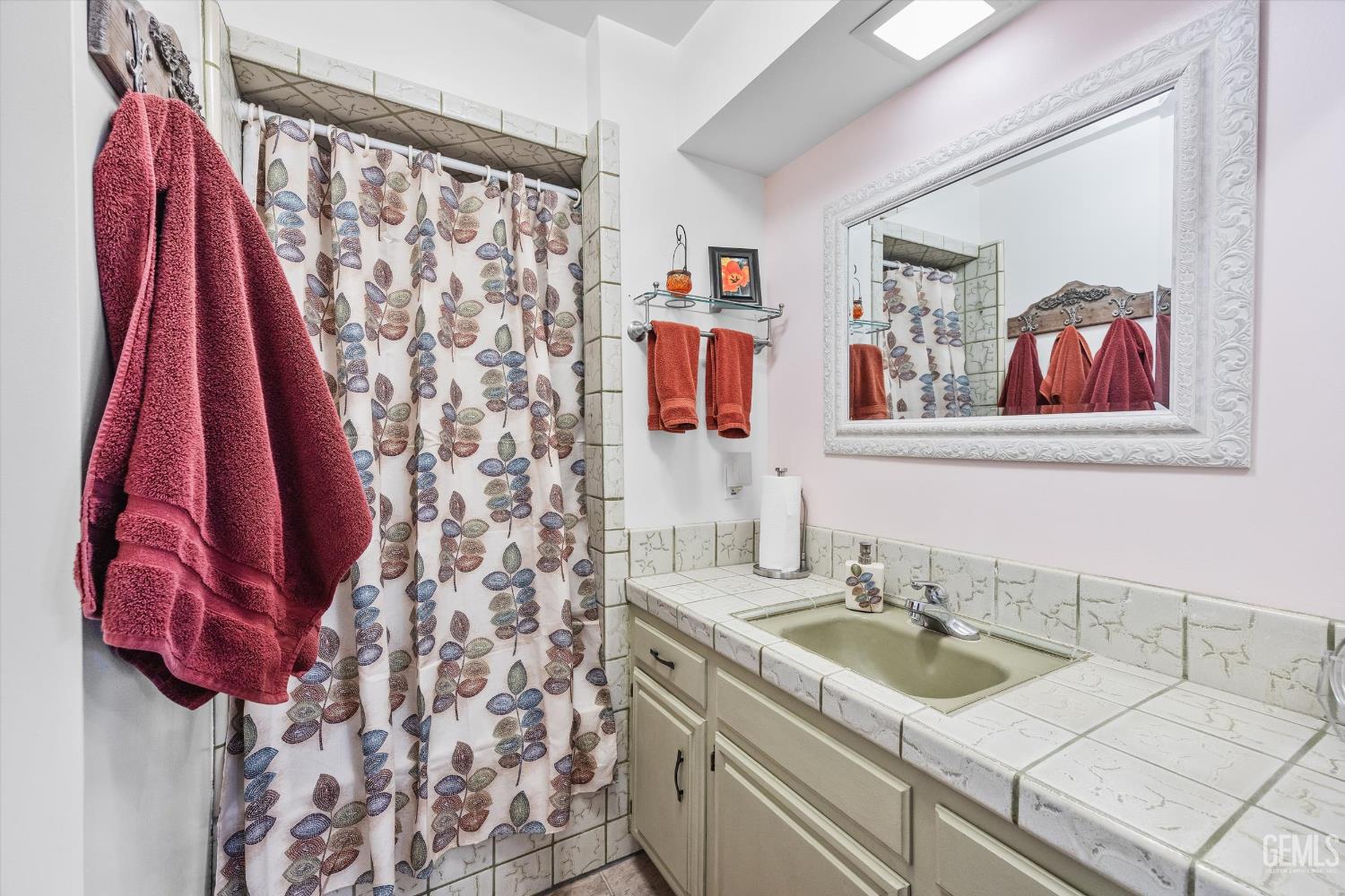 Undisclosed Address Tehachapi, CA 93561 - Photo 32 of 48 a bathroom with a sink and a mirror