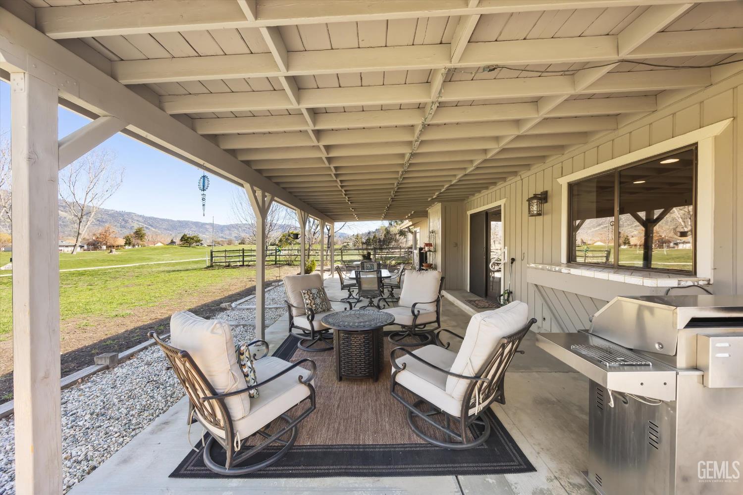 Undisclosed Address Tehachapi, CA 93561 - Photo 34 of 48 a building outdoor space with patio furniture and garden