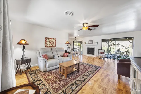a kitchen with stainless steel appliances a sink a stove and cabinets