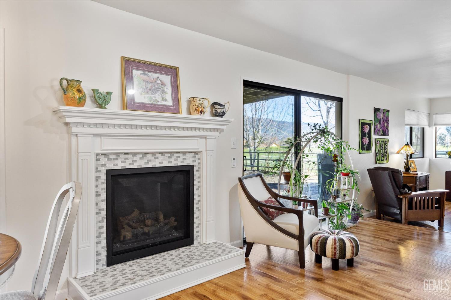 Undisclosed Address Tehachapi, CA 93561 - Photo 10 of 48 a living room with furniture a window and a fireplace