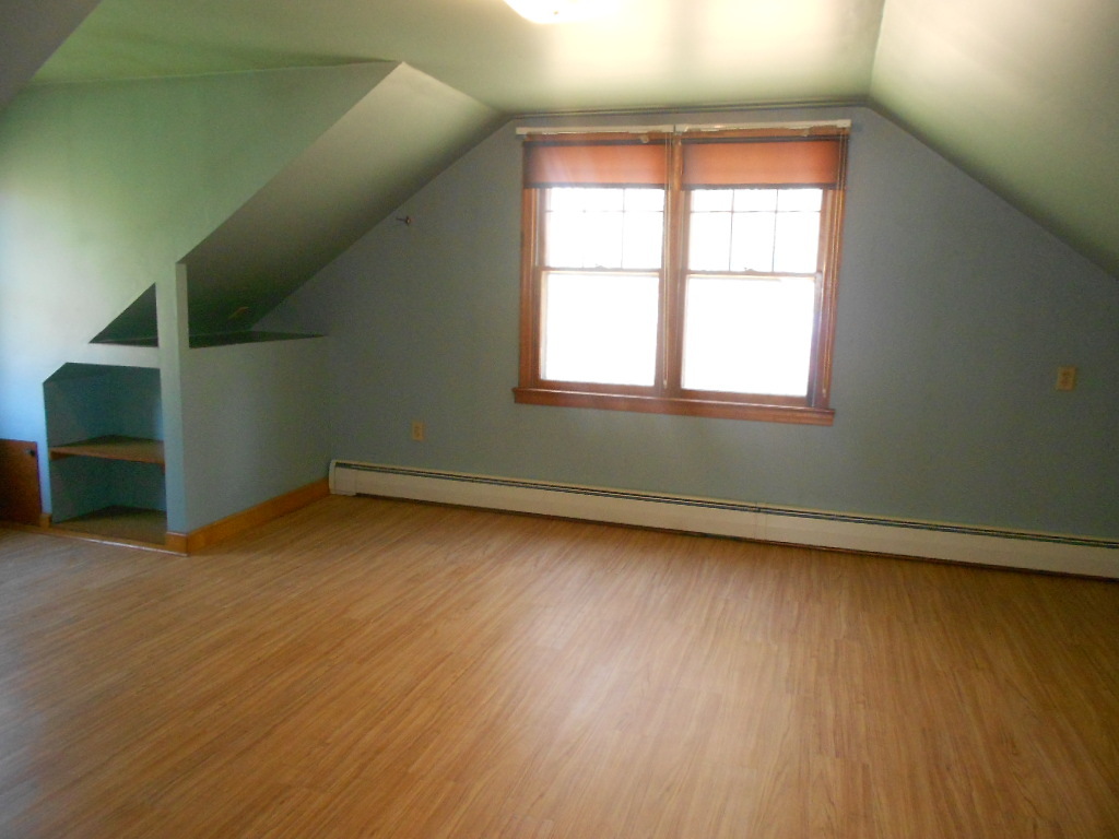 1031 State Road Richmond, MA 01254 - Photo 8 of 13 an empty room with wooden floor and windows