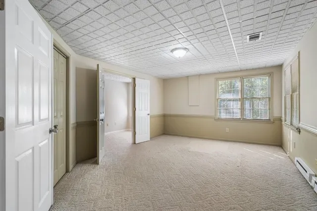 a view of a chair and table in the balcony