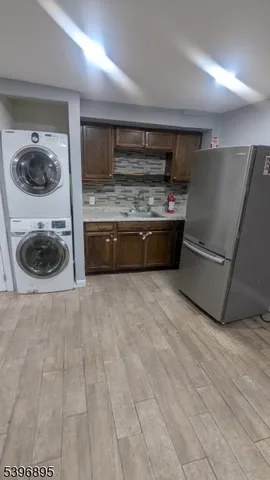 a view of an empty room with a fireplace