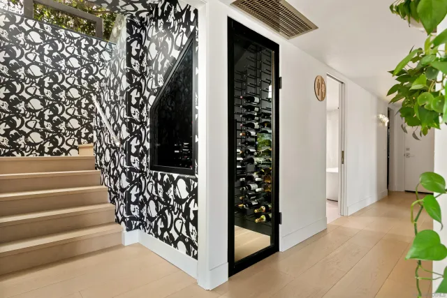 a bathroom with a white tub shower