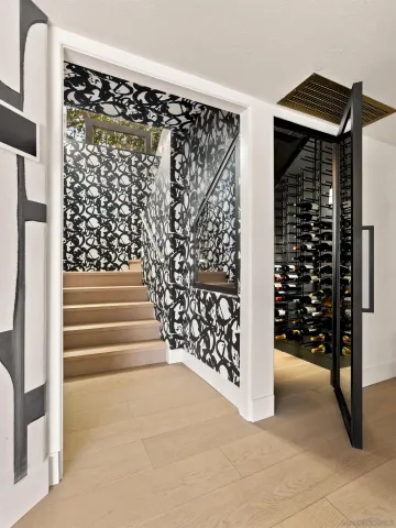 a bathroom with a bathtub shower sink mirror and toilet