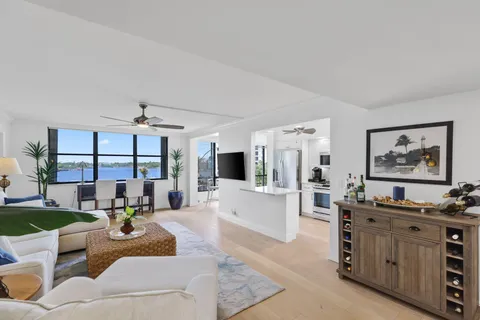 a living room with furniture and flat screen tv