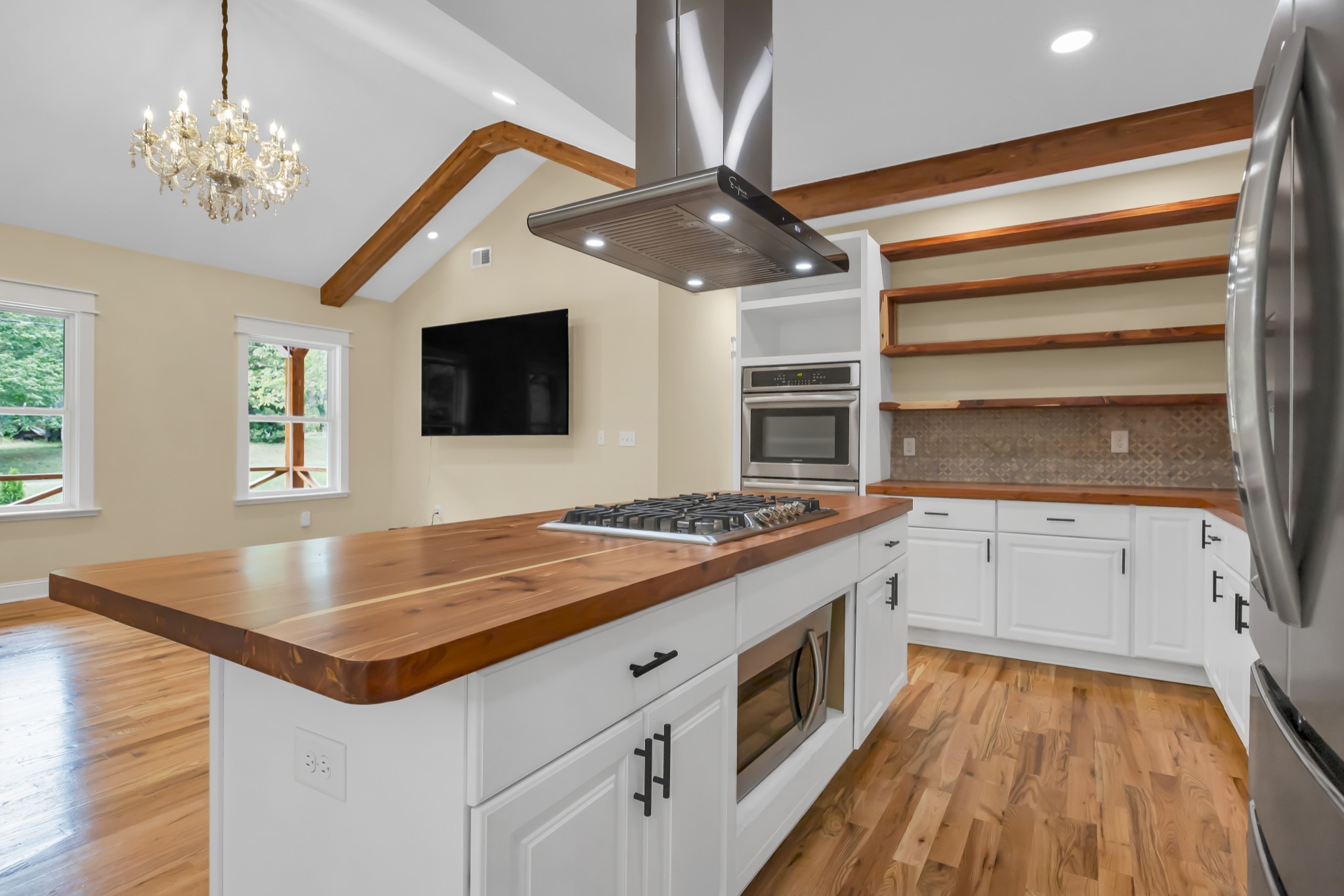 2250 Wayne Road Bon Aqua, TN 37025 - Photo 16 of 48 a kitchen with stainless steel appliances granite countertop a stove and a sink