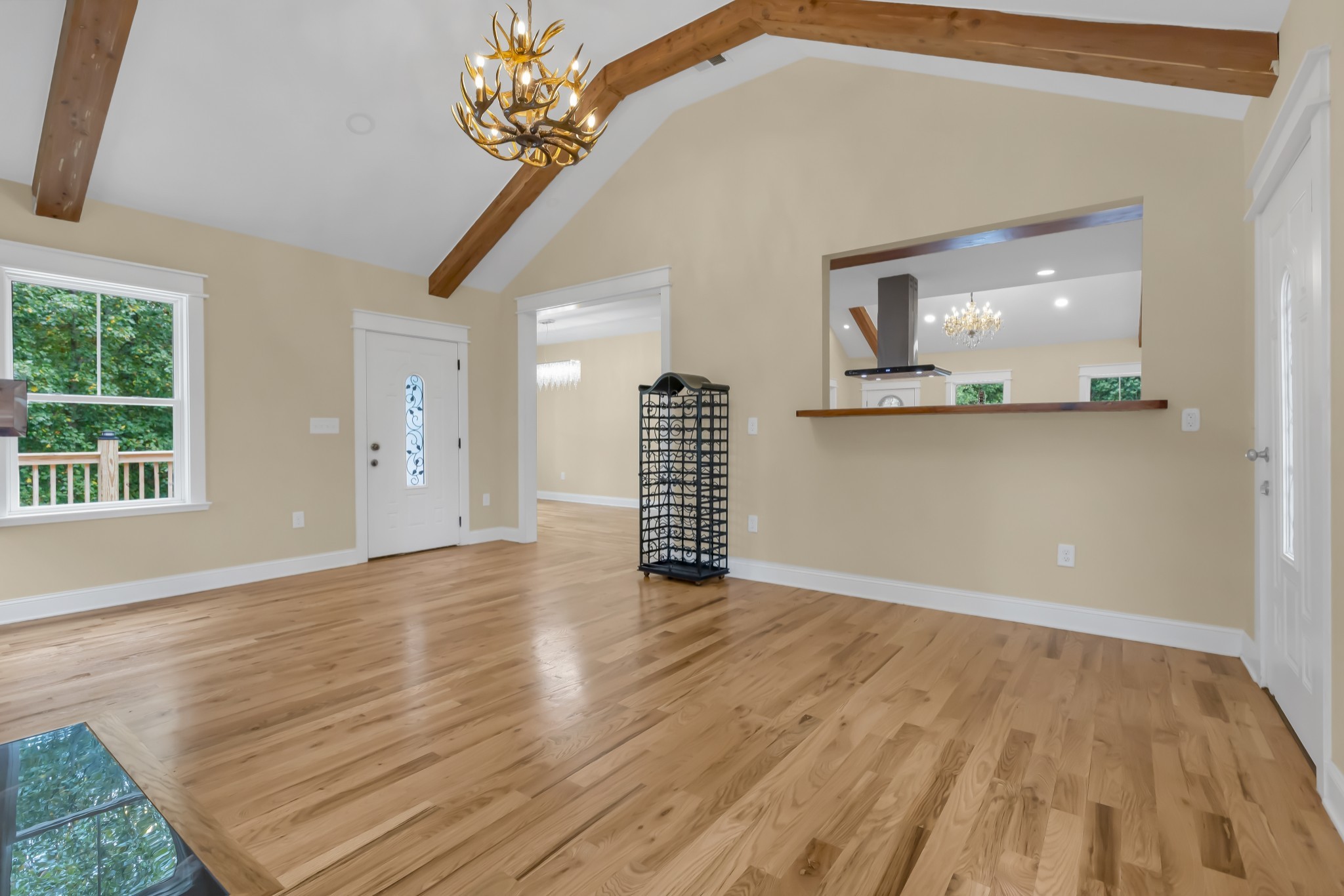 2250 Wayne Road Bon Aqua, TN 37025 - Photo 25 of 48 a view of a livingroom with wooden floor and a staircase