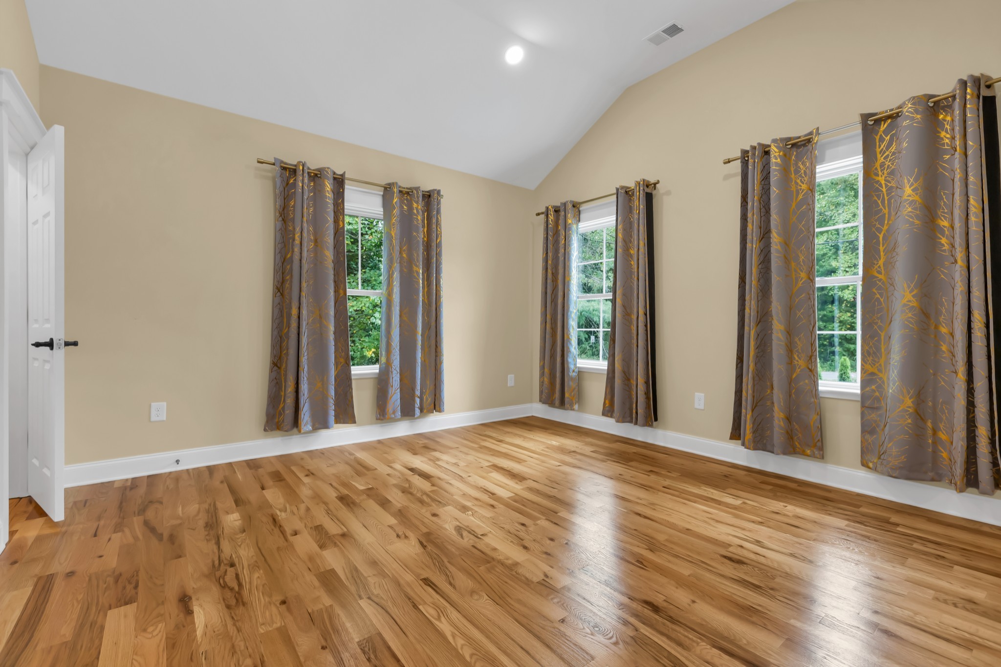 2250 Wayne Road Bon Aqua, TN 37025 - Photo 27 of 48 a view of a room with a large window and wooden floor