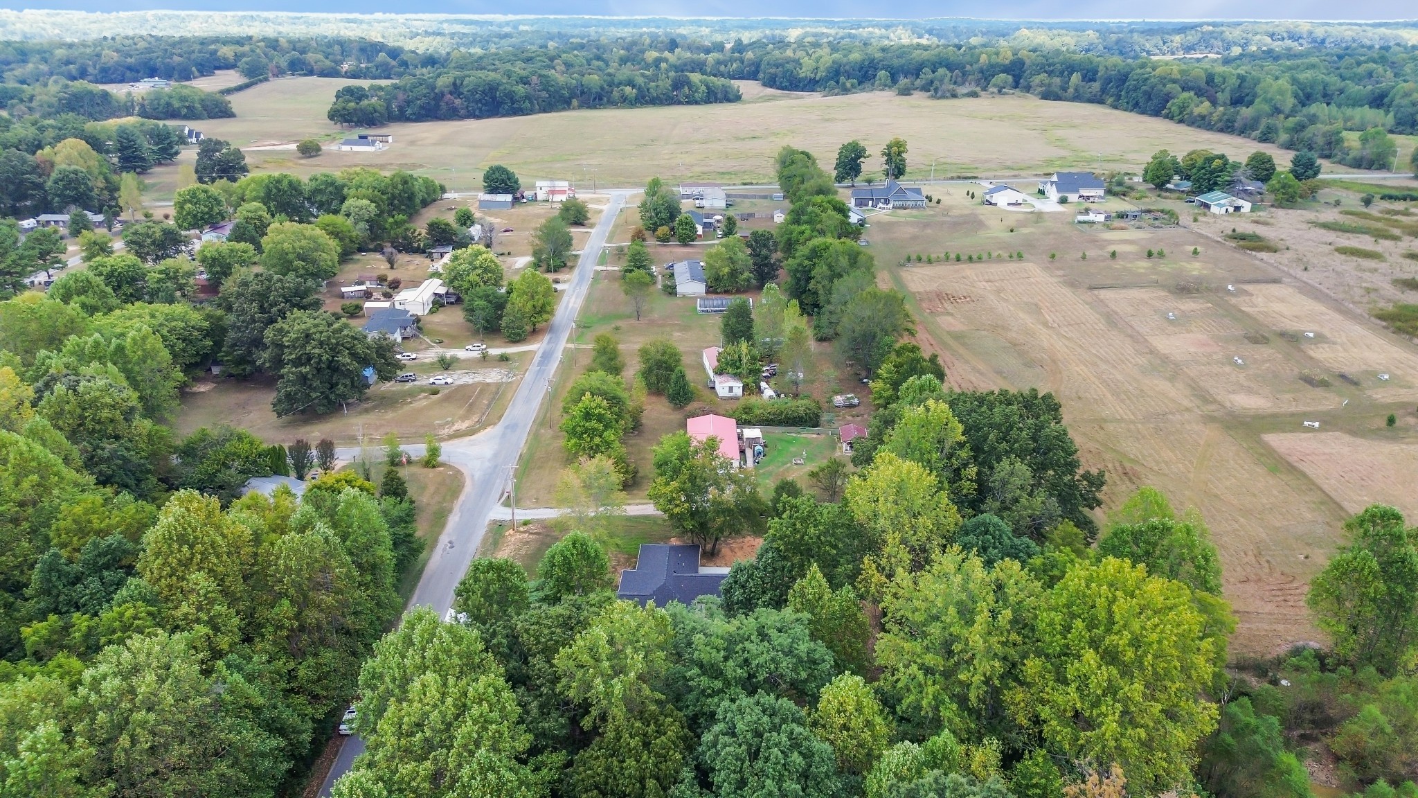 2250 Wayne Road Bon Aqua, TN 37025 - Photo 47 of 48 an aerial view of lake residential house with outdoor space and trees around