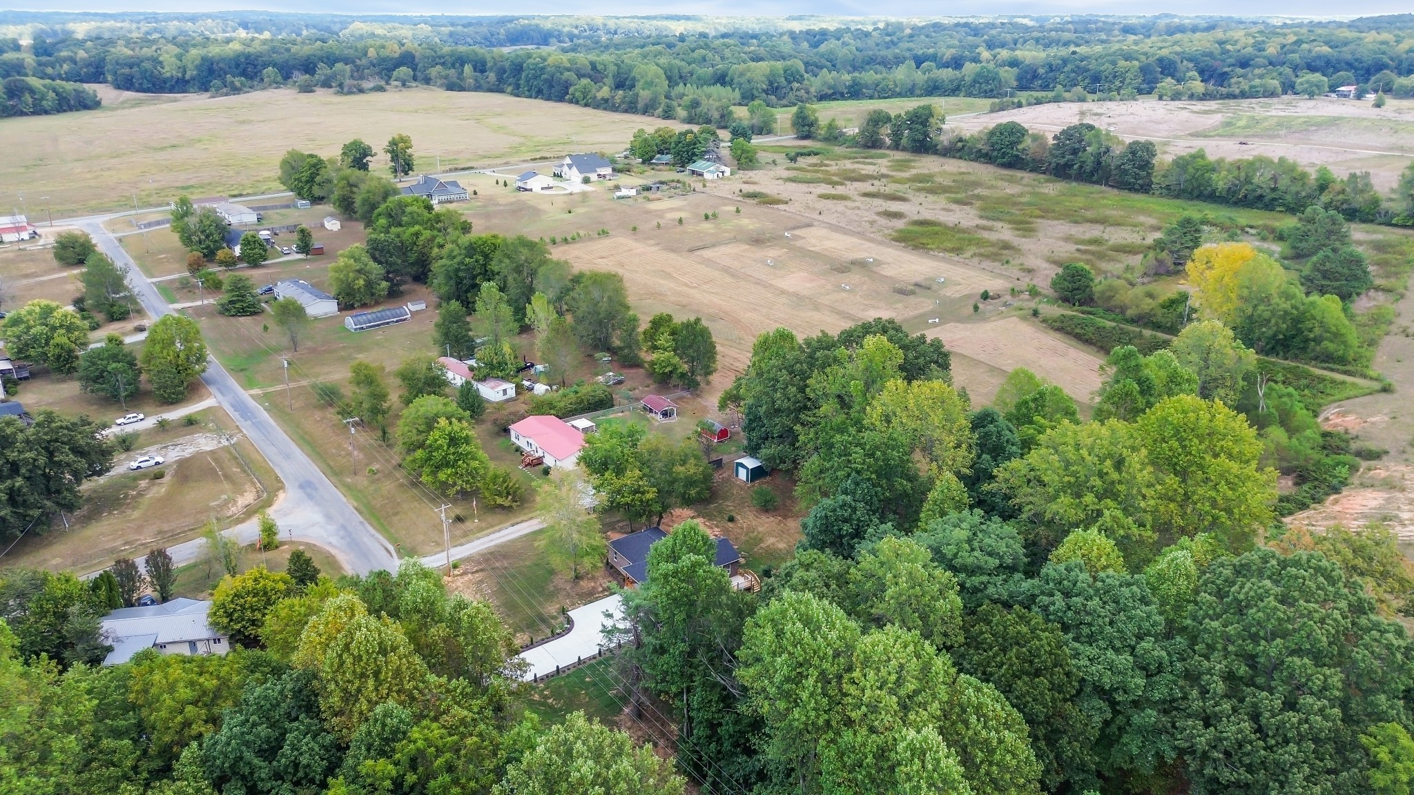 2250 Wayne Road Bon Aqua, TN 37025 - Photo 7 of 48 an aerial view of lake residential house and outdoor space