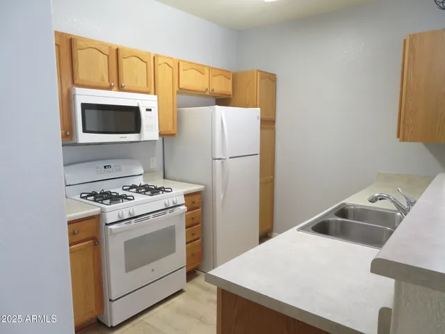 a bathroom with a sink vanity and a mirror
