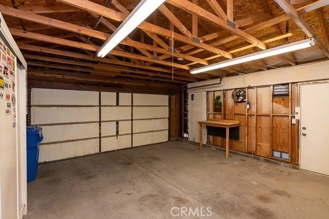 a view of a room with wooden walls