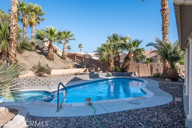 a view of a backyard of the house